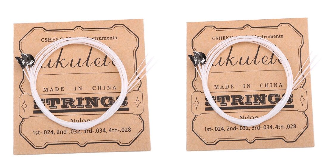 Zubehör für Ukulele -  2 x Satz Saiten -  5 x Kazoo -   10 Filzplektren  - Sonderpreis