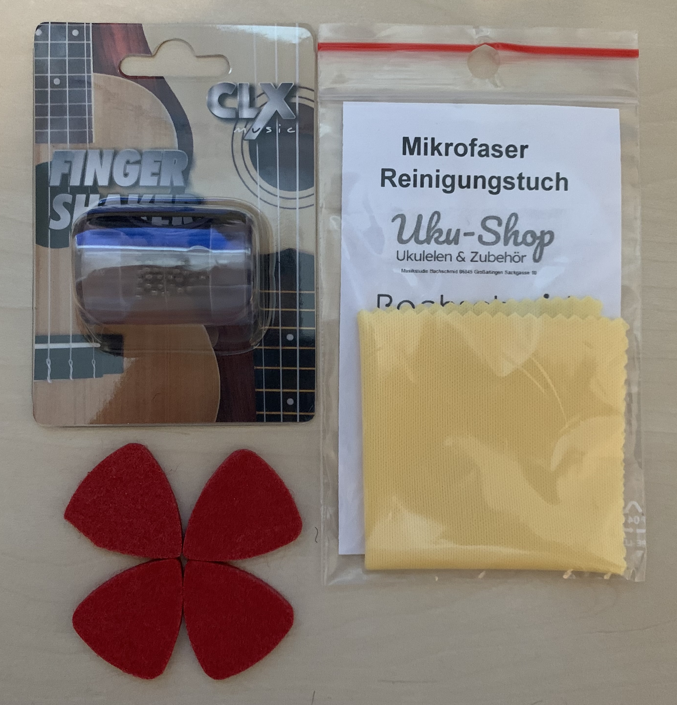 Ortega Konzert Ukulele metallic Rot mit Gigbag und Zubehör zum Sonderpreis